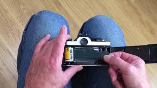 How to load 35mm film into a camera  two minute guide [upl. by Epoh]